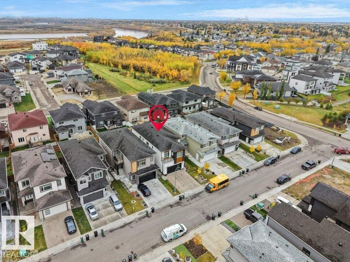 Property Photo:  1107 150 Av NW  AB T5Y 4C1 