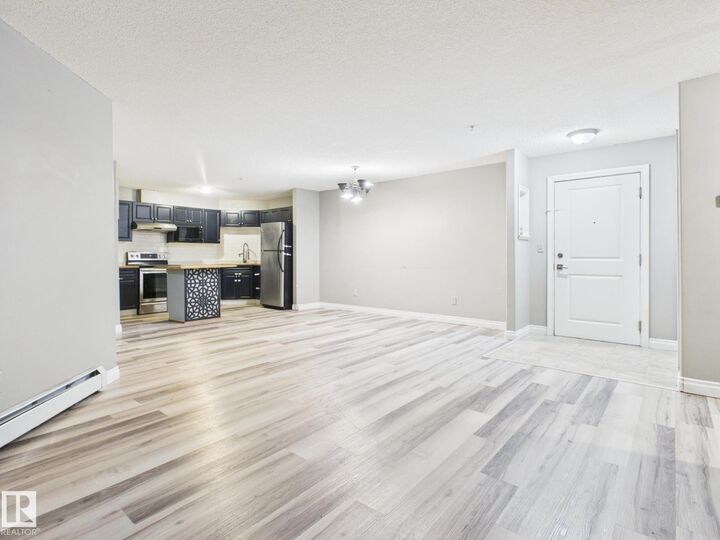 Property Photo:  #102 16221 95 St NW  AB T5Z 3V3 