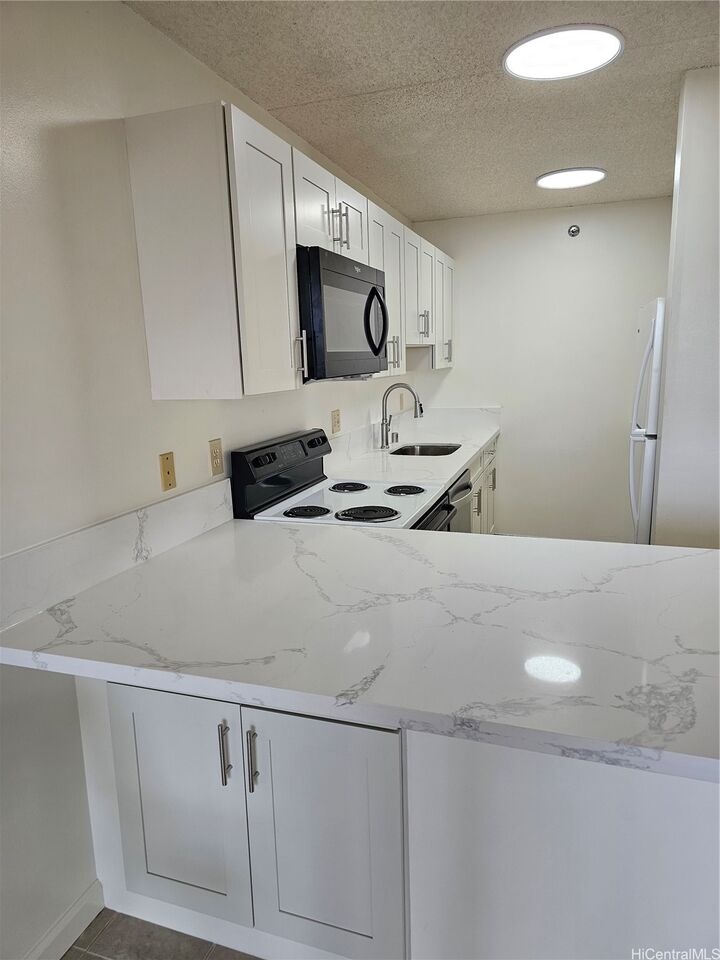 Property Photo:  98-402 Koauka Loop 1916  HI 96701 