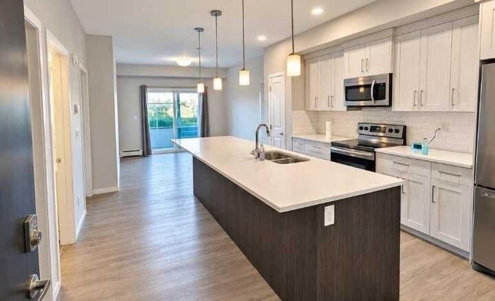 Property Photo: 4150 Seton Drive SE 113 AB T3M 2C7