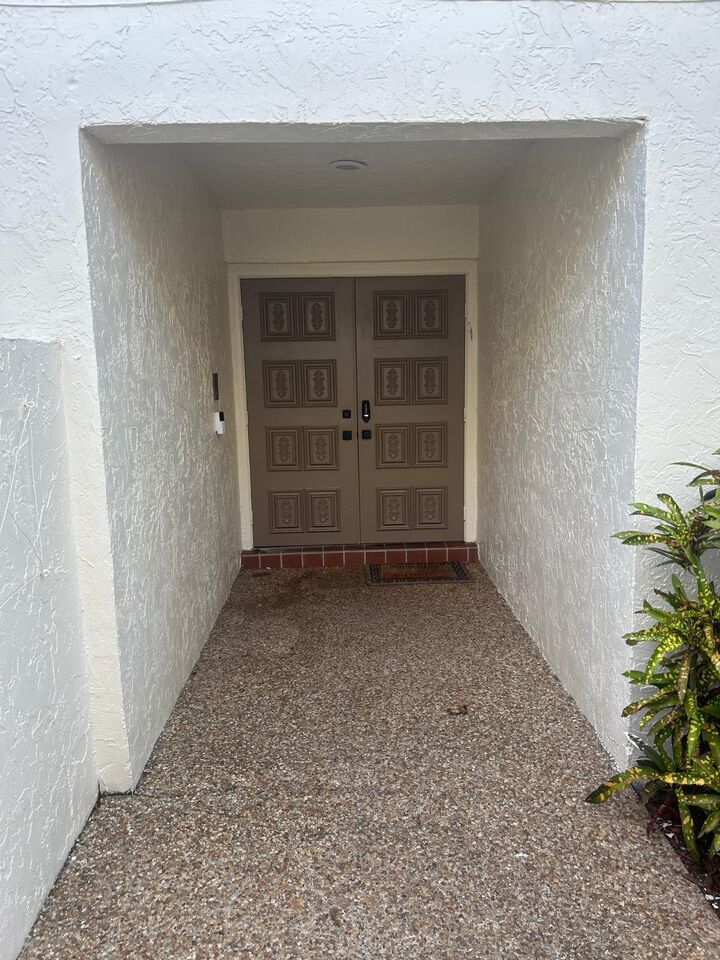 Property Photo:  6945 Palmar Court  FL 33433 