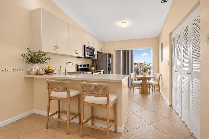 Property Photo:  6989 W 36th Ave 202  FL 33018 