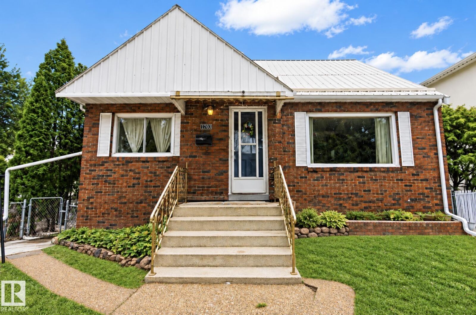 Property Photo:  7703 77 Avenue NW  AB T6C 0K6 