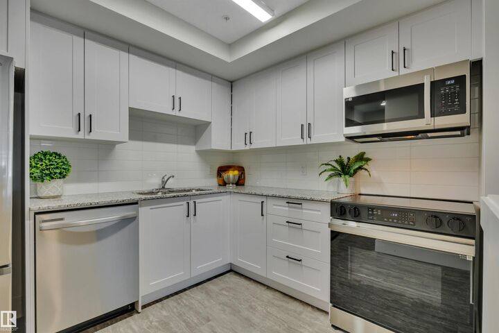 Property Photo:  9504 182 Street NW 310  AB T5T 3A7 