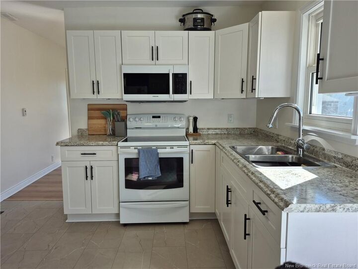 Property Photo:  557 Canada Street  NB E3A 4A8 