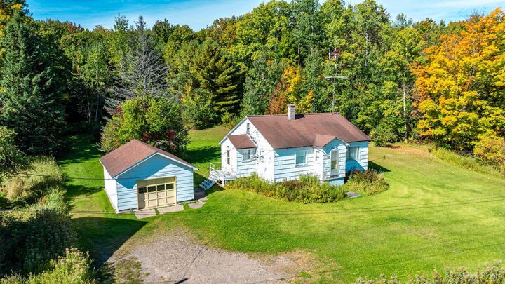 Property Photo:  42767 Wilson Memorial Drive  MI 49916 