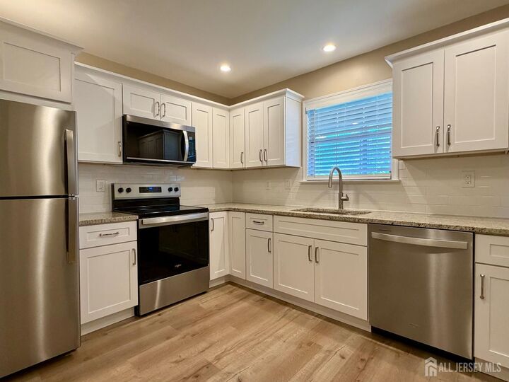 Property Photo: 8 Benjamin Franklin Drive F NJ 08831