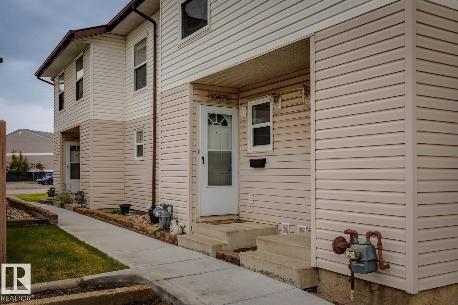 Property Photo:  10475 24 Avenue NW  AB T6J 4S2 