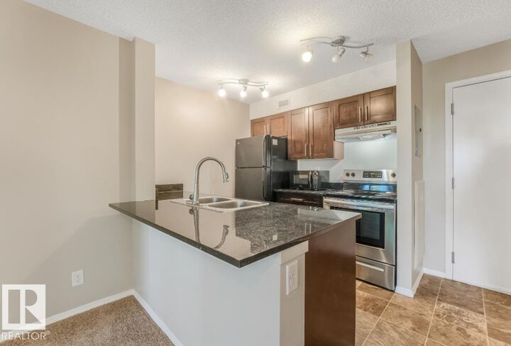 Property Photo:  530 Watt Boulevard SW  AB T6X 1P7 