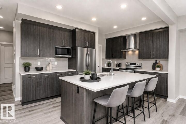 Property Photo:  6420 30 Avenue SW  AB T6X 3M9 
