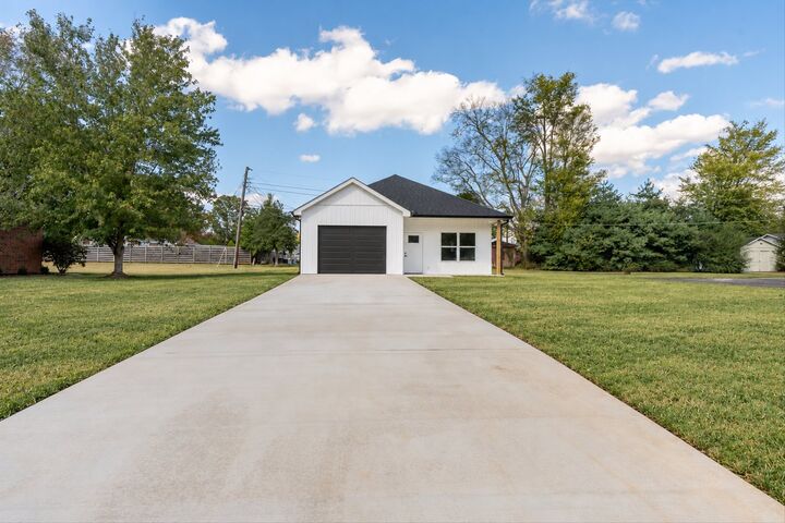 Property Photo:  702 1st St  TN 38464 