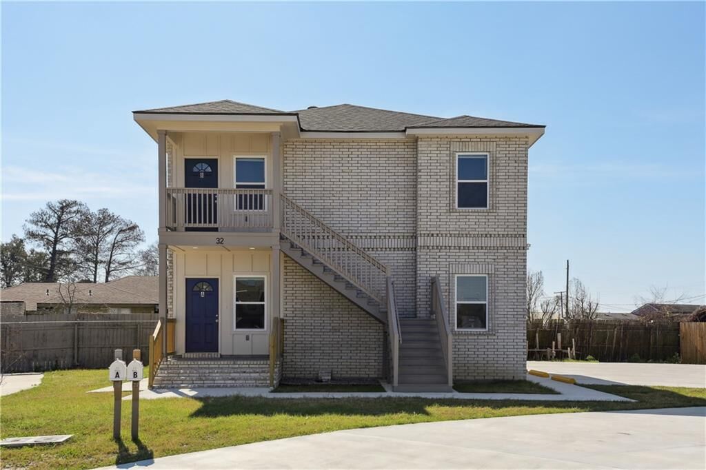 Property Photo:  32 Ashton Cox Drive A  LA 70053 