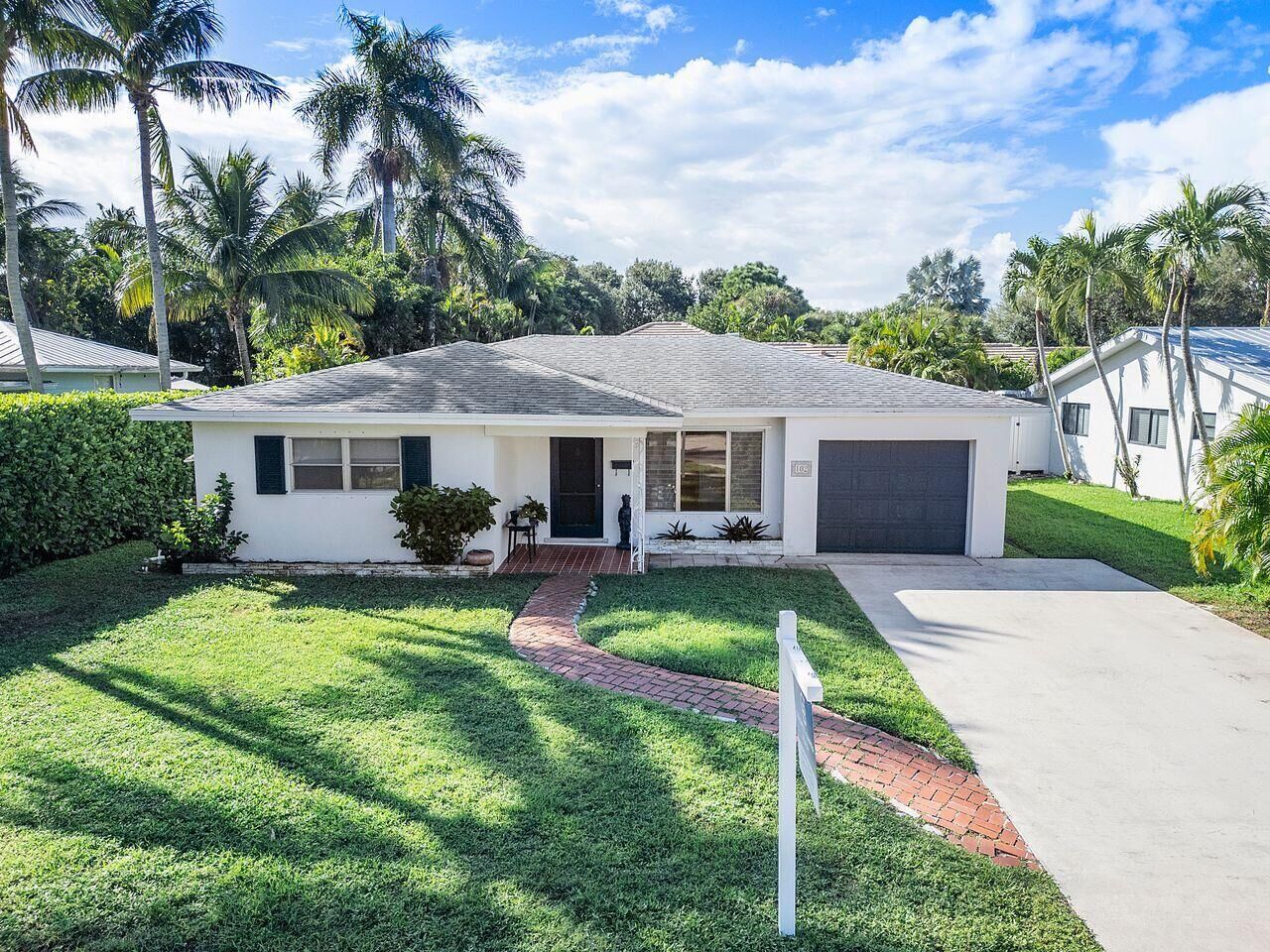 Property Photo: 102 NW 12th Street FL 33444