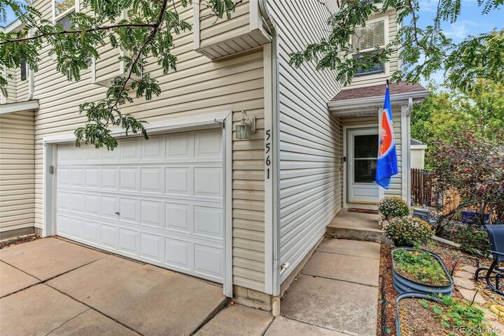 Property Photo:  5561 S Quemoy Circle  CO 80015 