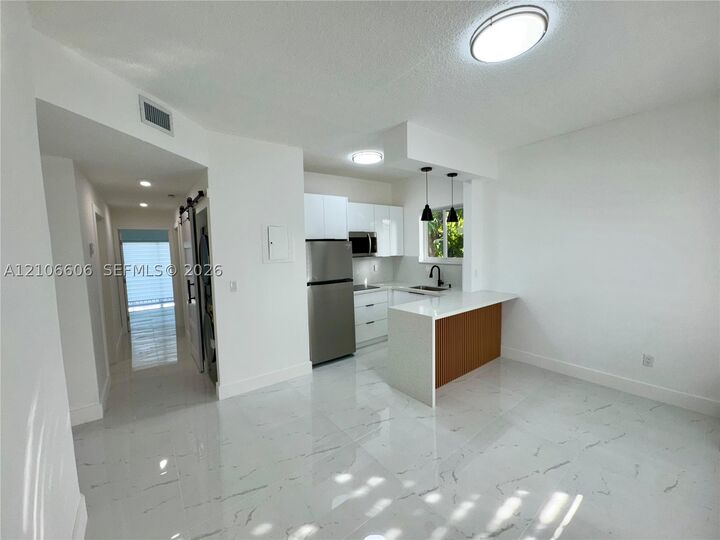 Property Photo:  421 NW 13th Ave B  FL 33125 