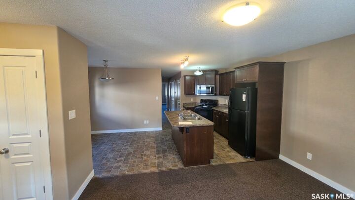 Property Photo: 139 St John Street N SK S4R 2V8