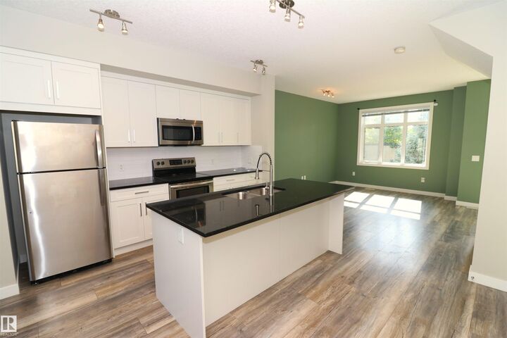 Property Photo:  600 Bellerose Drive 77  AB T8N 7T5 