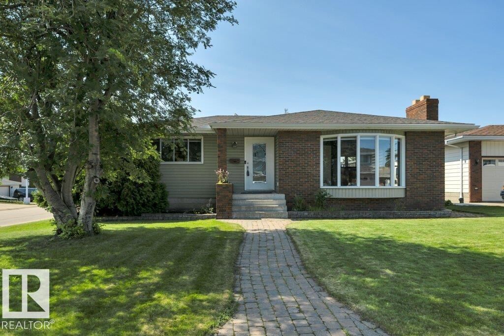 Property Photo:  6960 21 Avenue NW  AB T6K 2H4 