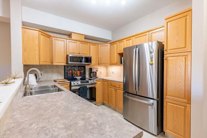 Property Photo:  29 River Ridge Drive NW 418  AB T1A 8V3 