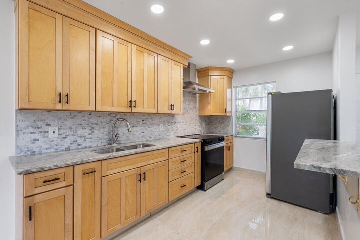 Property Photo:  100 Lake Rebecca Drive  FL 33411 