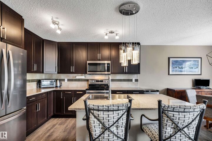 Property Photo:  5033 Andison Close SW  AB T6W 3T4 