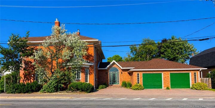 Property Photo:  102 St. George  NB E2A 1B5 