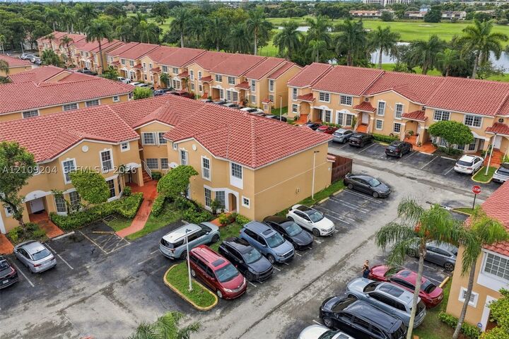 Property Photo:  14345 SW 57th Ln 5-1  FL 33183 