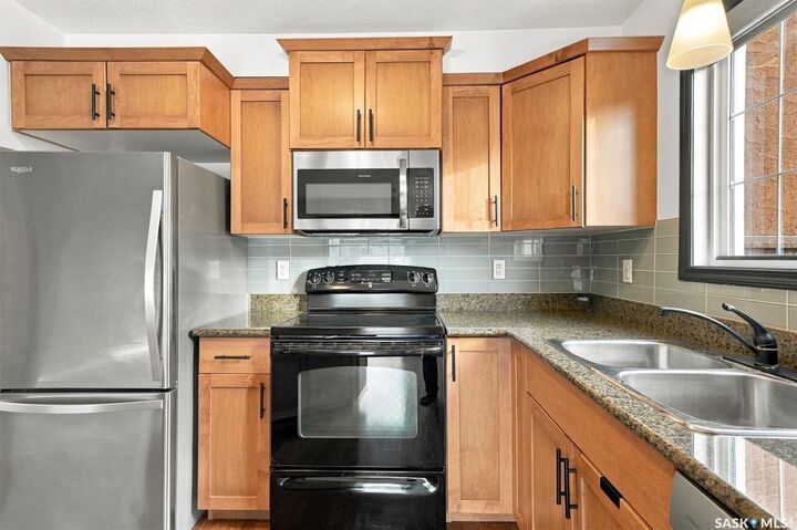 Property Photo:  103 Wellman Crescent A110  SK S7T 0C1 