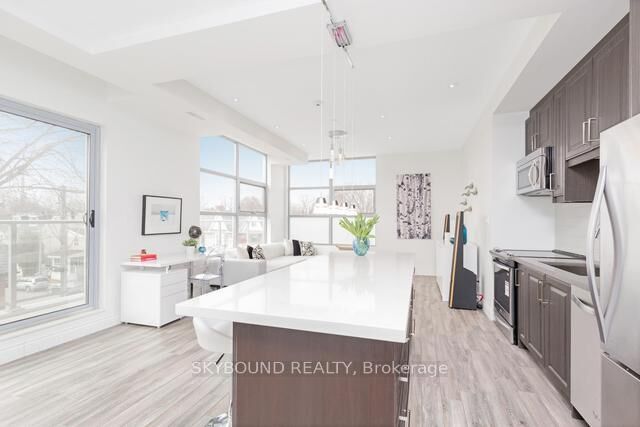 Property Photo:  1003 Queen Street E 303  ON M4M 1K3 