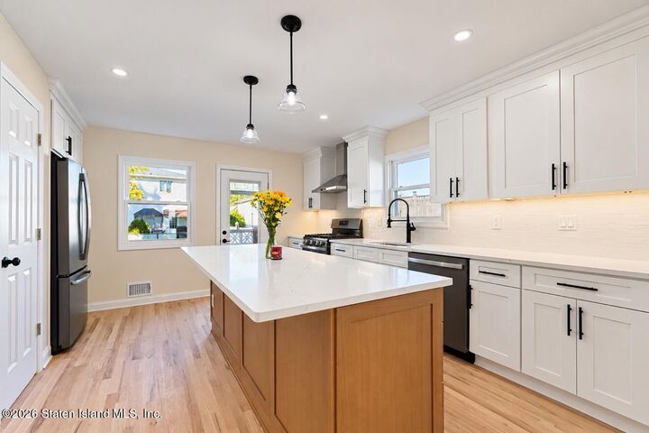 Property Photo:  208 Eltingville Boulevard  NY 10312 
