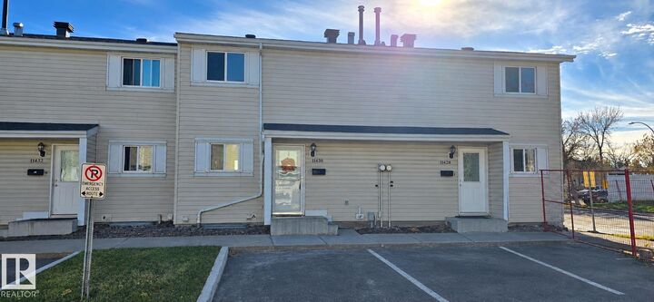 Property Photo:  11430 139 Avenue NW  AB T5X 3L4 
