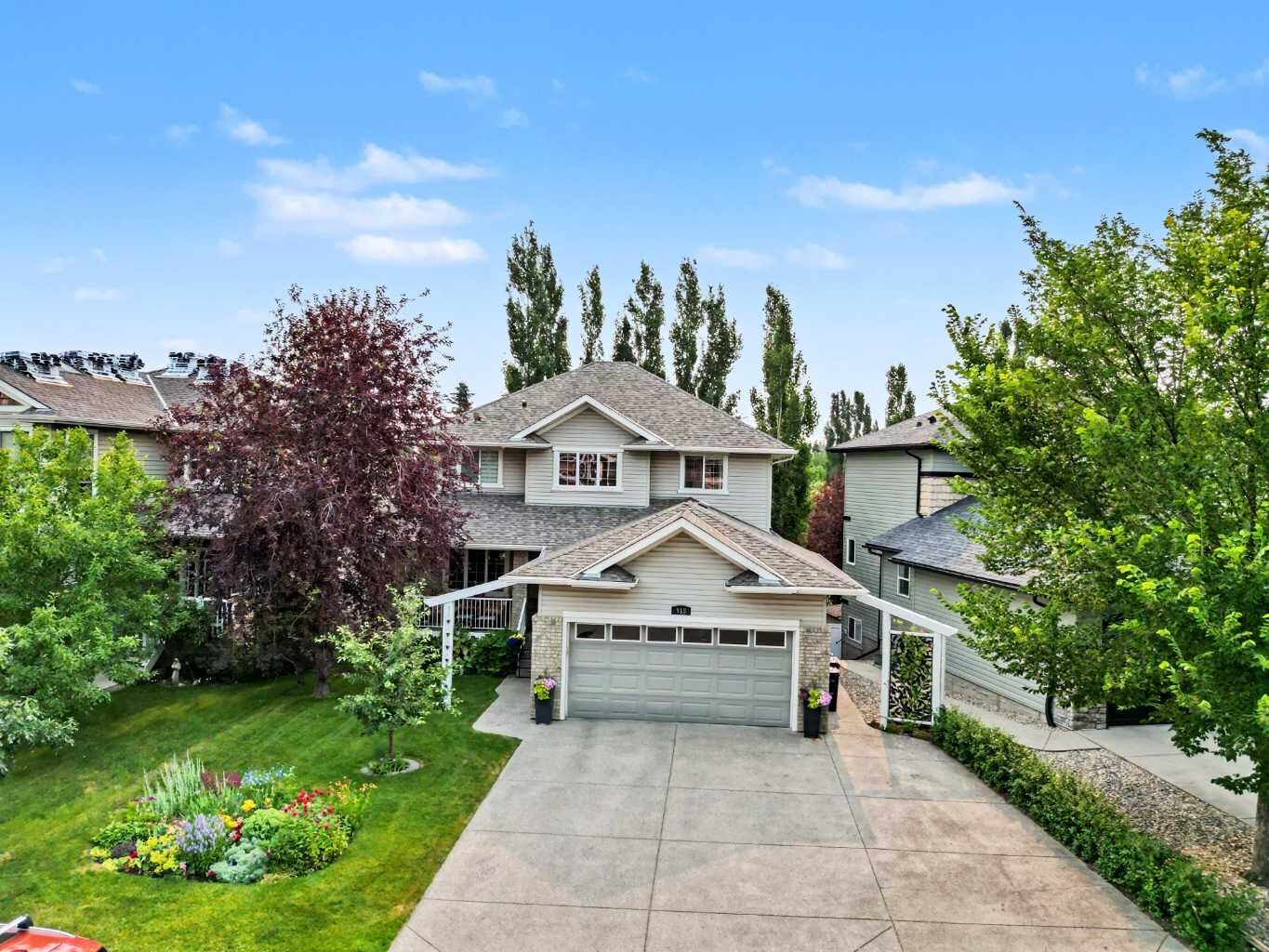 Property Photo:  915 Coopers Drive SW  AB T4B 2W3 
