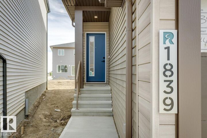 Property Photo: 1839 188 Street NW AB T6T 2M9