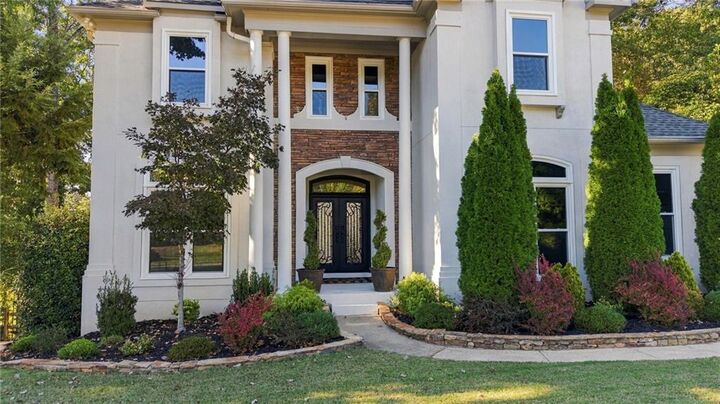 Property Photo: 5925 Masters Club Drive GA 30024