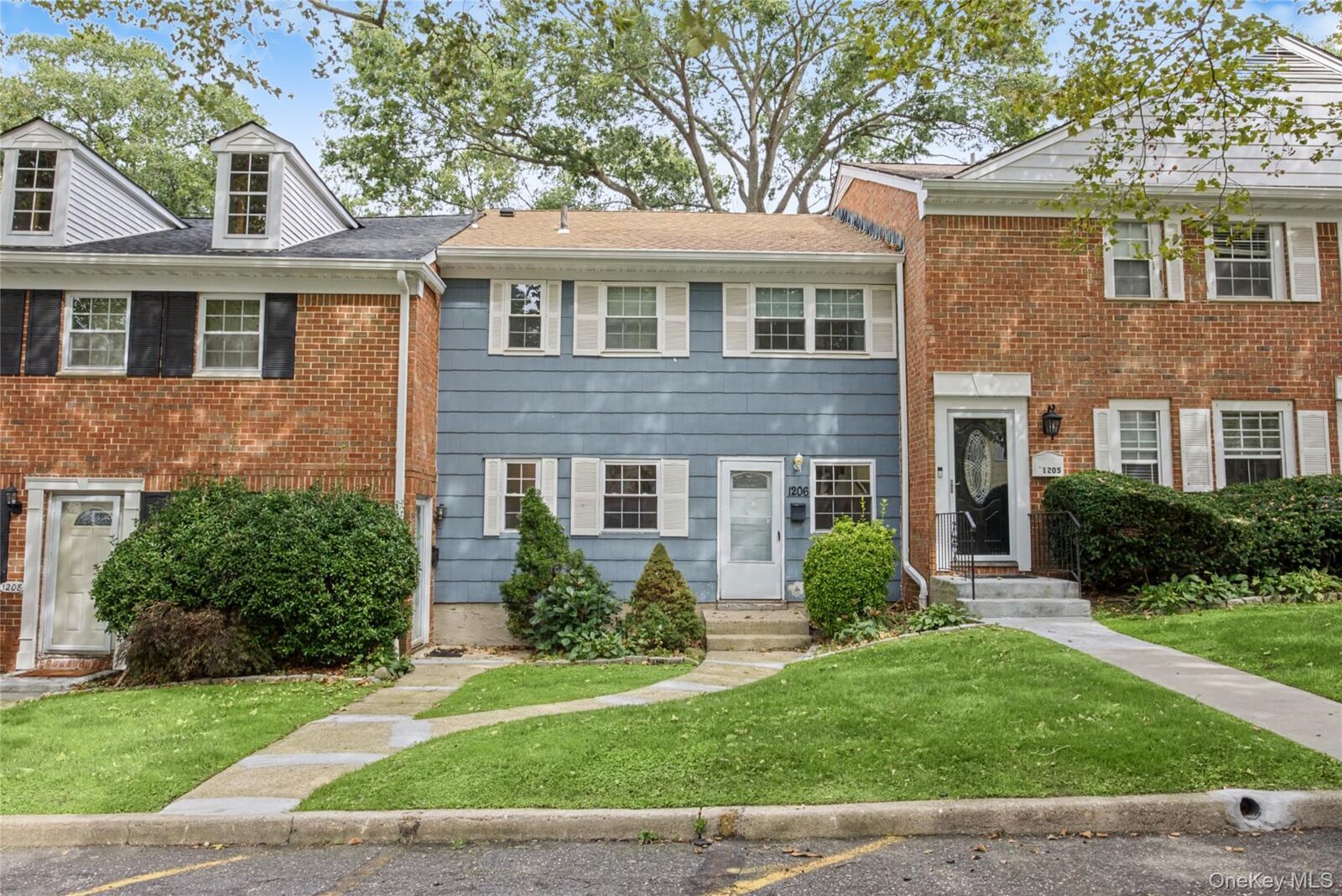 Property Photo:  1206 Towne House Village  NY 11749 