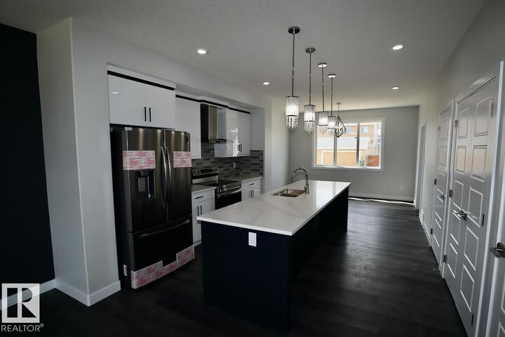 Property Photo:  284 Rolston Wynd Upper  AB T9E 1G5 