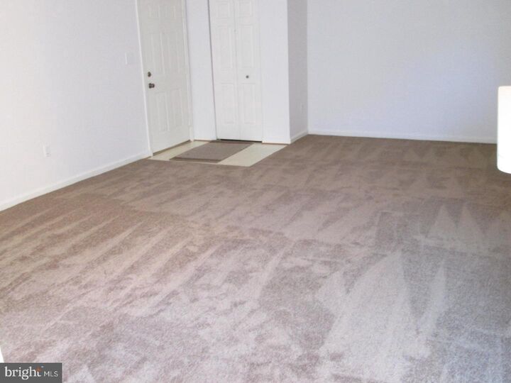 Property Photo: 695 Winding Stream Way #104 MD 21113