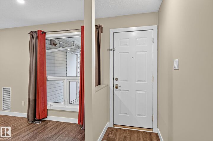 Property Photo: 2115 118 Street NW 12 AB T6J 5N1