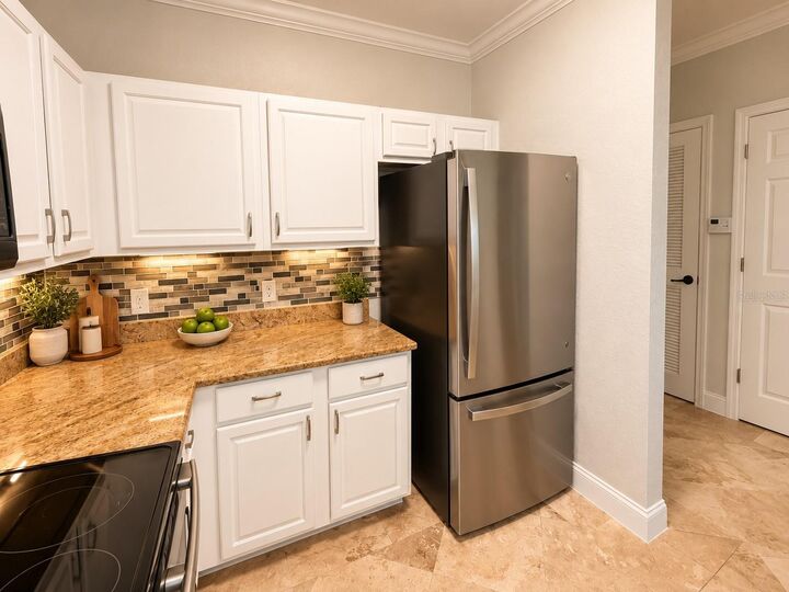 Property Photo:  8010 Tuscany Way 5205  FL 33896 