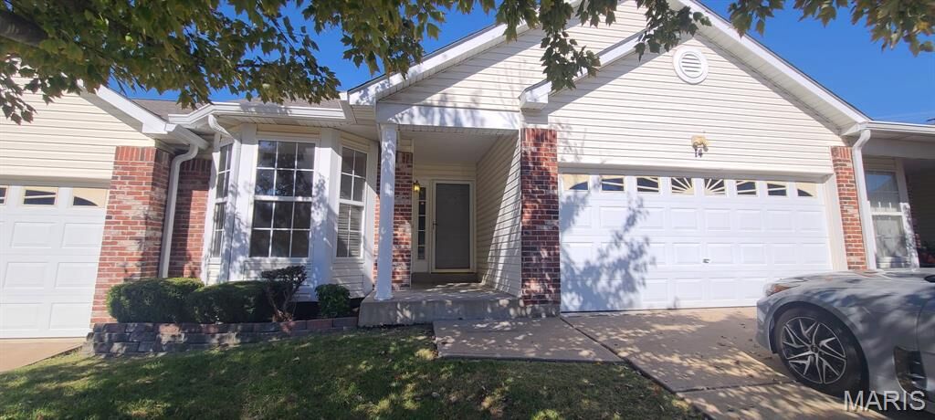 Property Photo:  14 Twelve Oaks Court 8C  MO 63376 