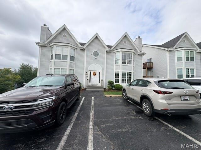 Property Photo: 1700 Whispering Creek Drive A MO 63021