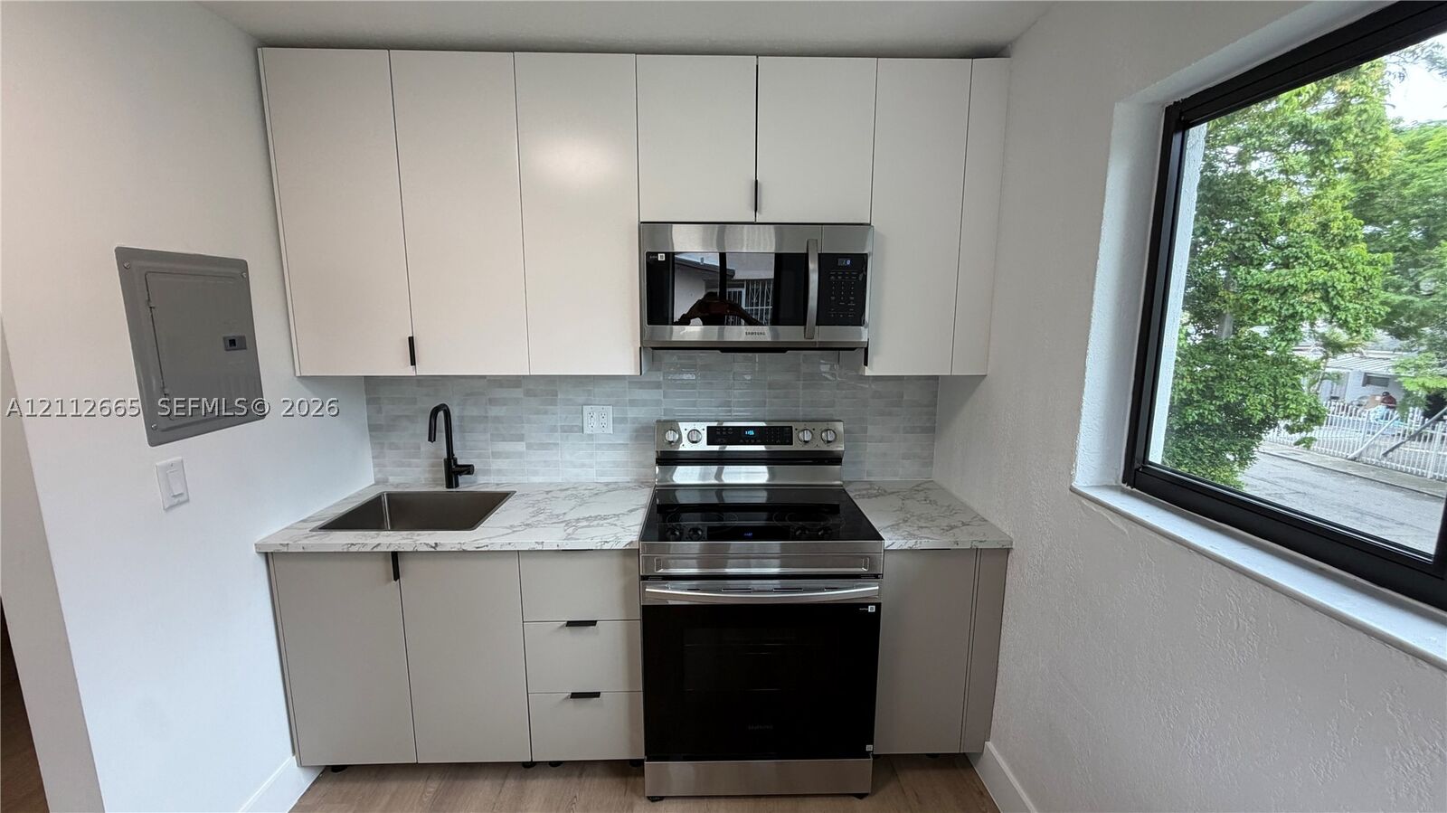 Property Photo:  3314 NW 8th 2  FL 33131 
