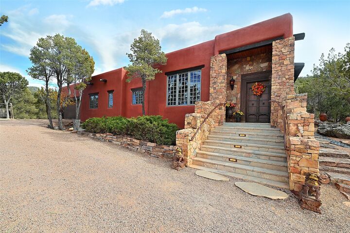 Property Photo:  878 Paseo Del Sur  NM 87501 