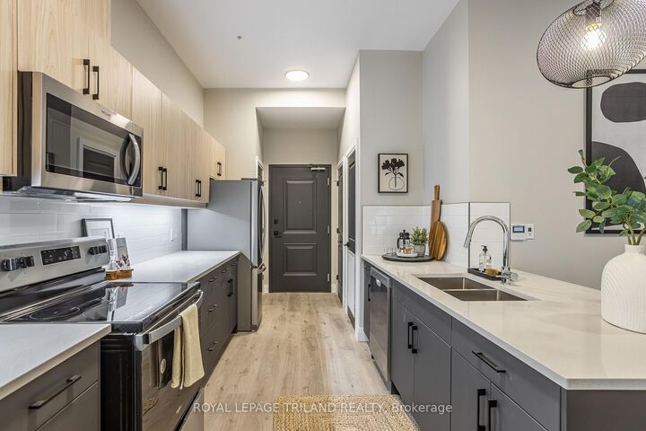 Property Photo: 1405 Stackhouse Avenue 107 ON N5X 0P2