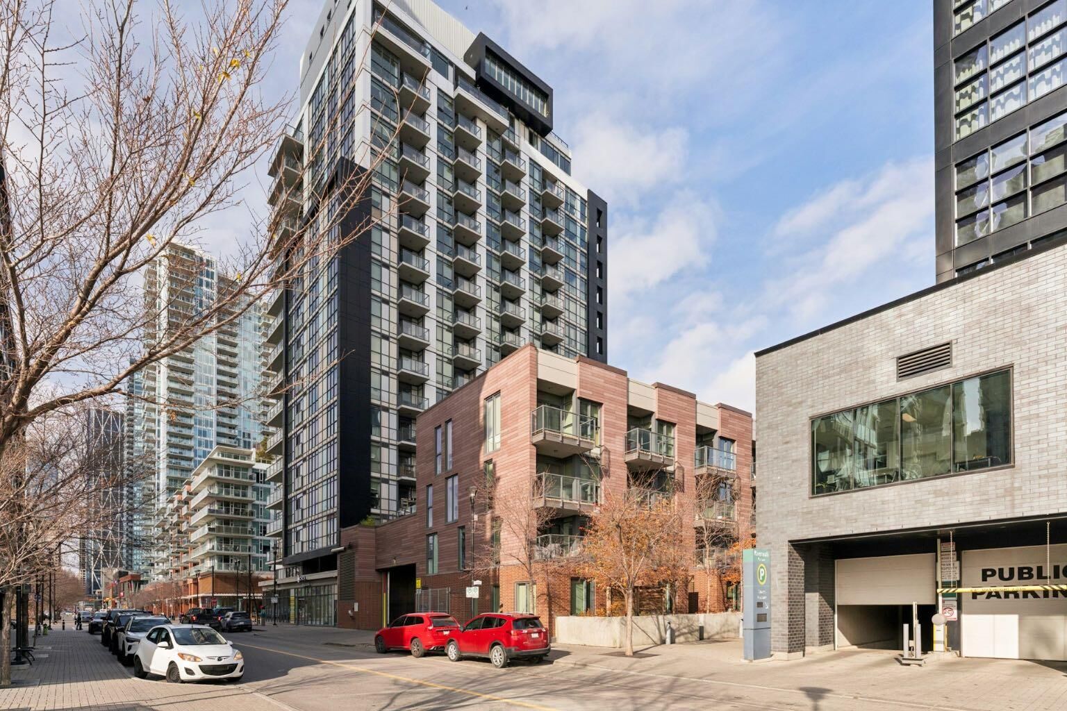 Property Photo:  619 Confluence Way SE 124  AB T2G 0G1 