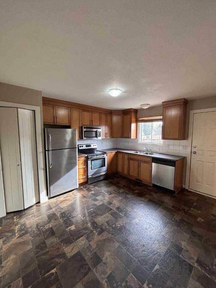 Property Photo: 244 Mt Alderson Crescent W AB T1K 6V8