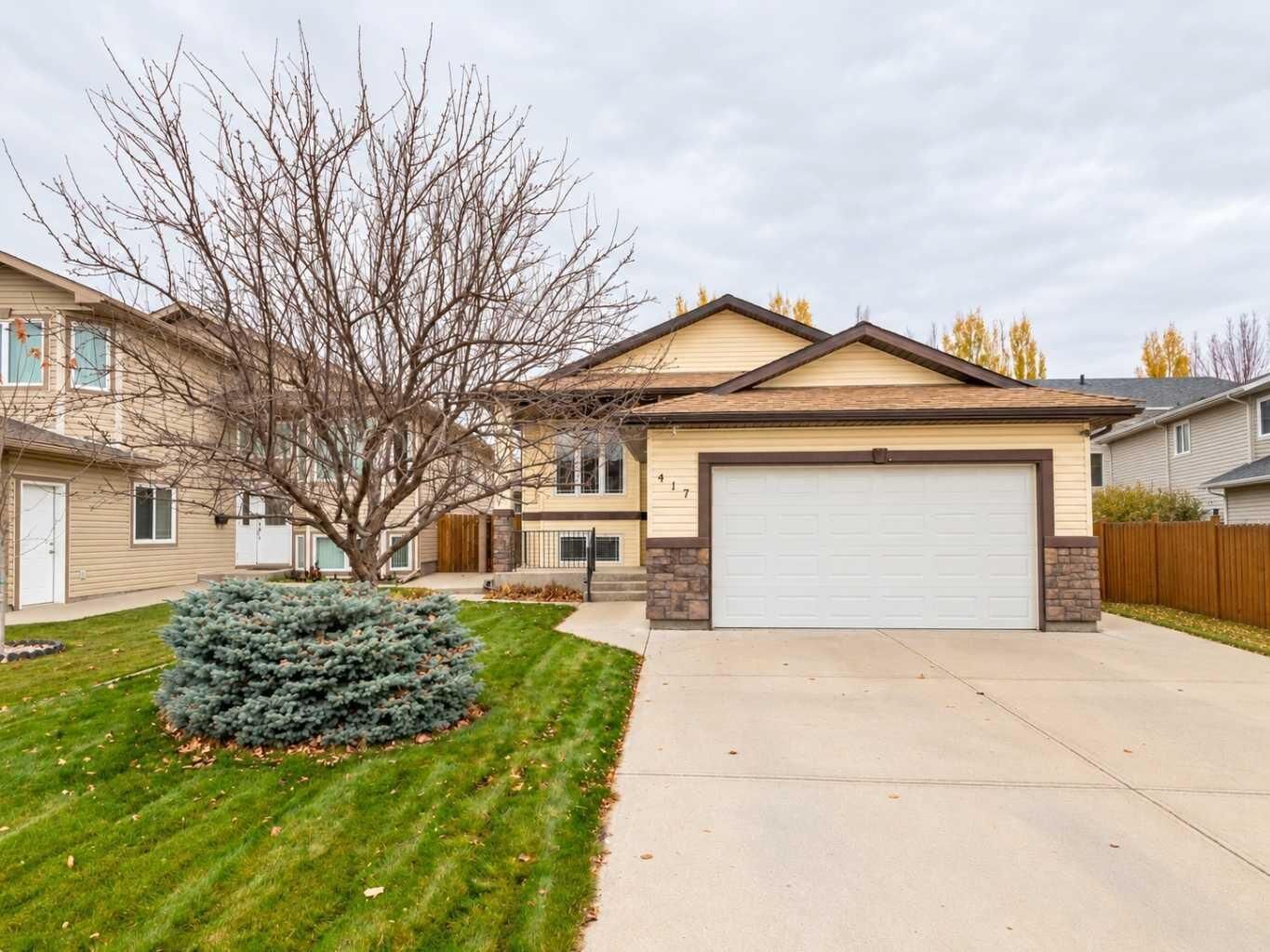 Property Photo:  417 Grizzly Crescent N  AB T1H 5N3 