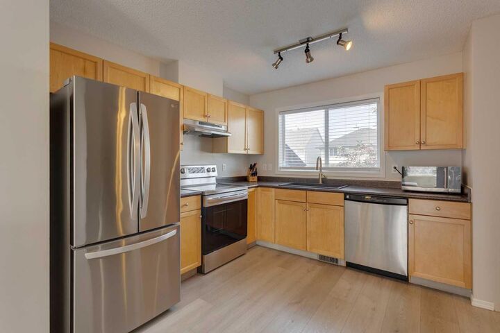 Property Photo:  180 Prestwick Acres Lane SE  AB T2Z 3Y2 