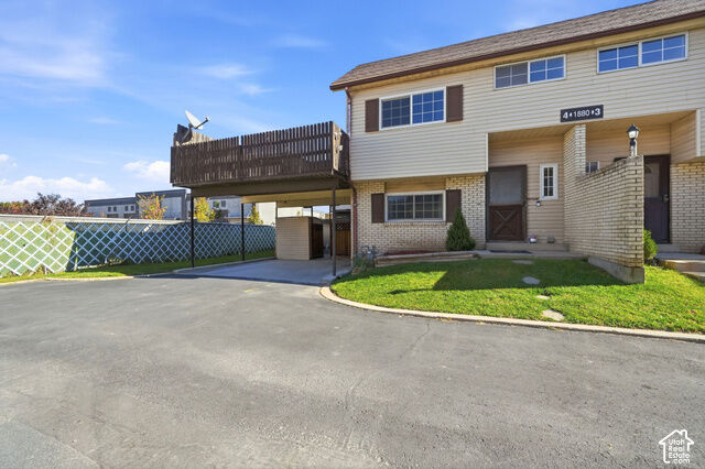 Property Photo: 1880 W Homestead Farms Ln S 4 UT 84119