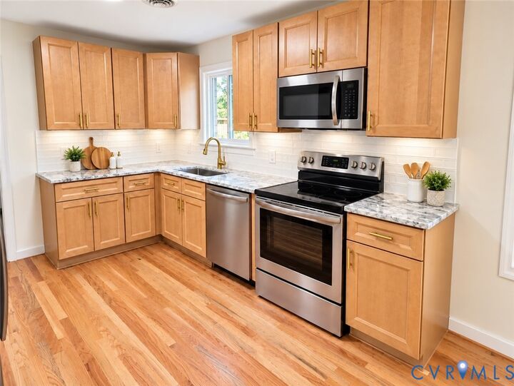Property Photo: 7950 Kenmore Drive VA 23111